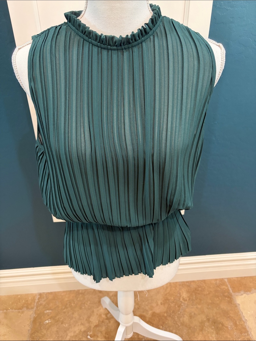 Naked Zebra Hunter green sleeveless peplum top